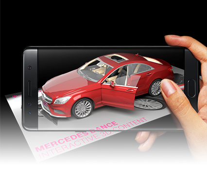Ein Auto wird auf einem Augmented Reality Marker visuell platziert.